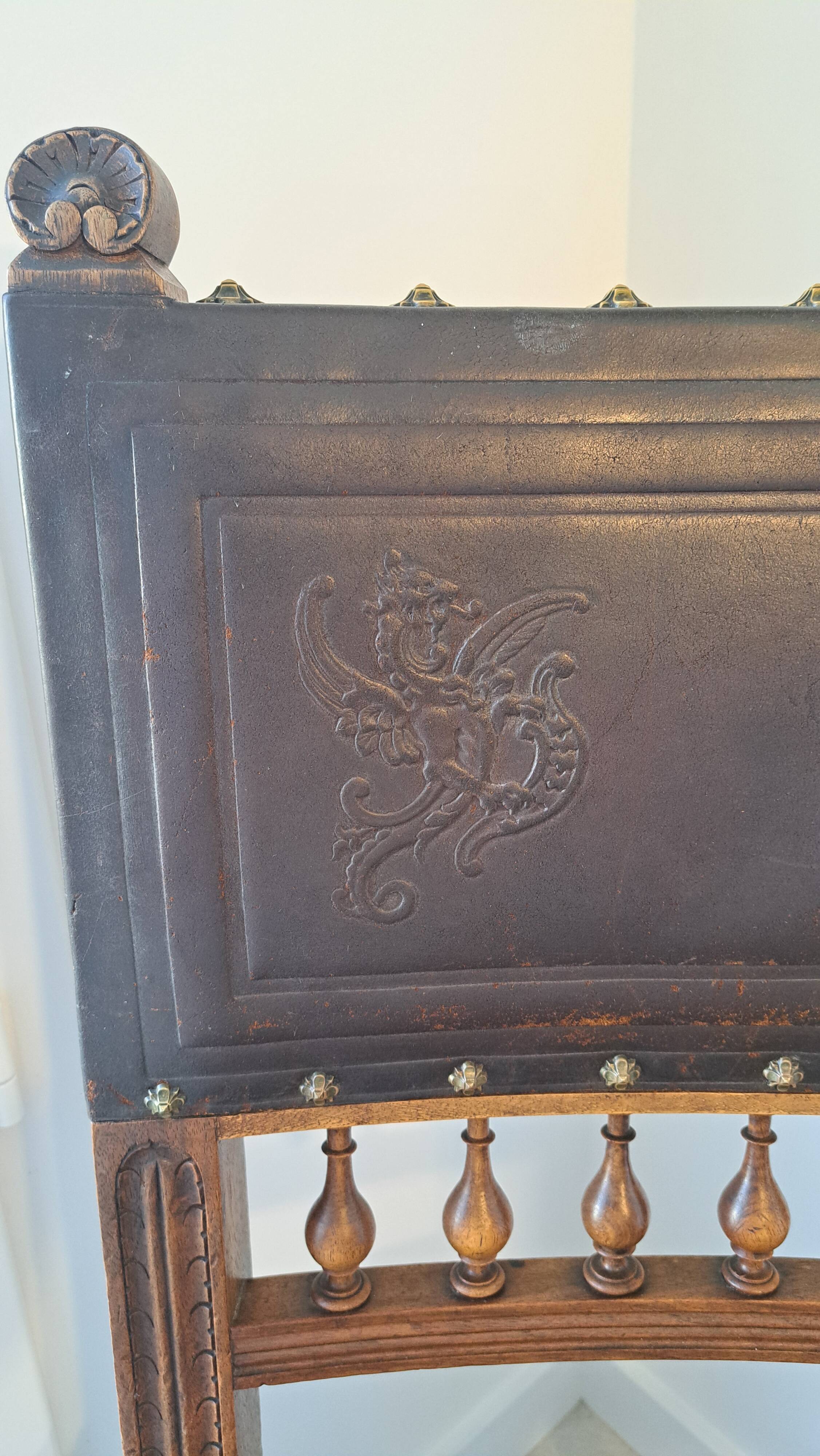 Pair of antique chairs in embossed leather, Henri II style.