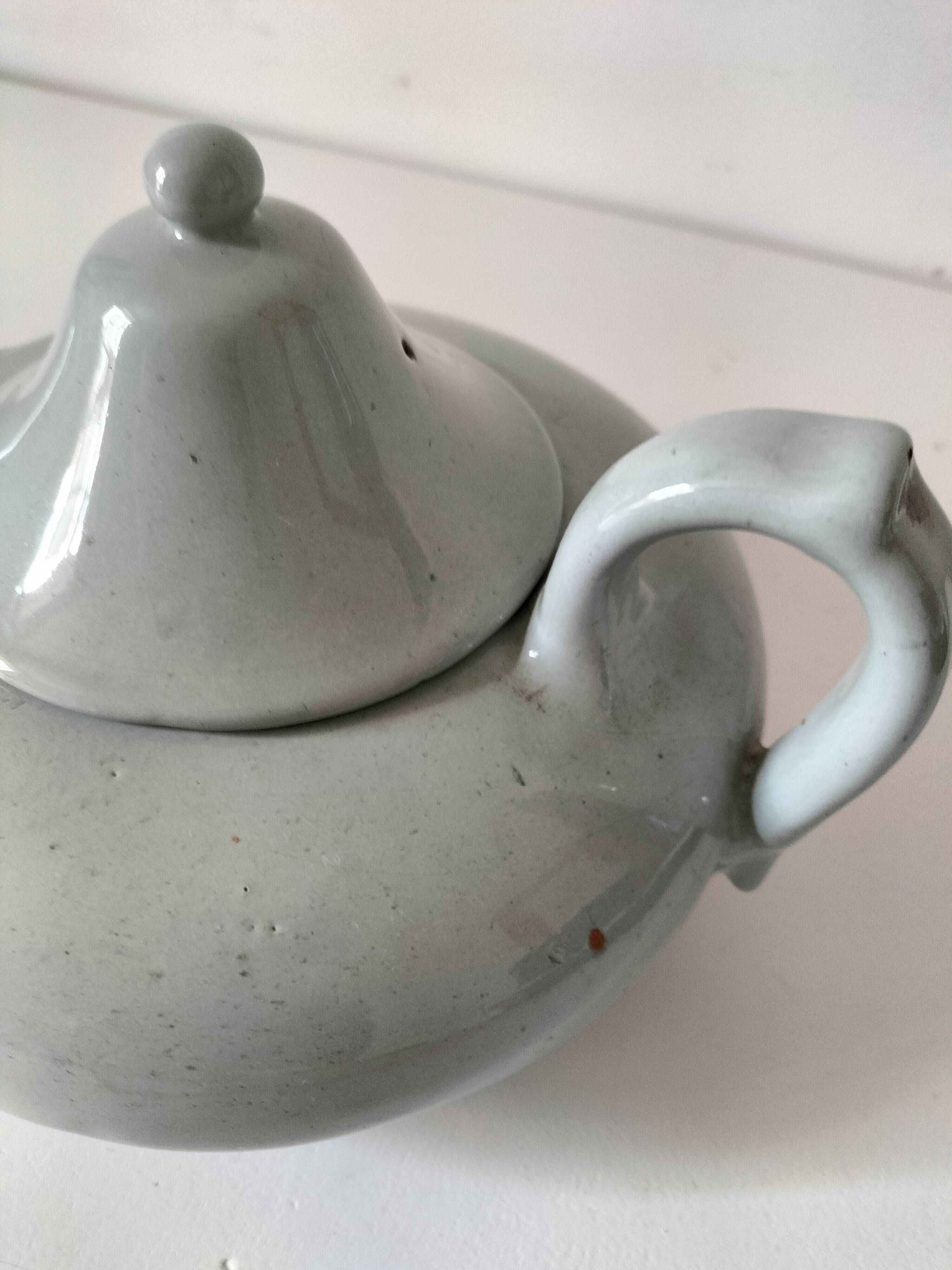 Celadon speckled glazed ceramic teapot