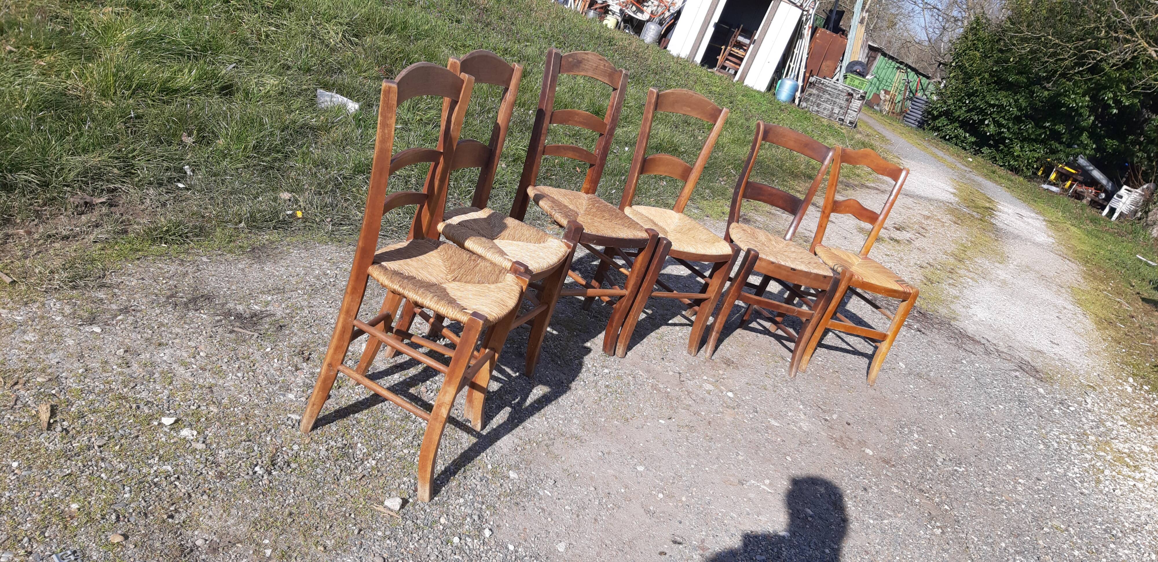 6 antique and mismatched mulched chairs