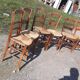 6 antique and mismatched mulched chairs
