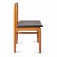 Oak chair with a black leather seat made in the 1960s