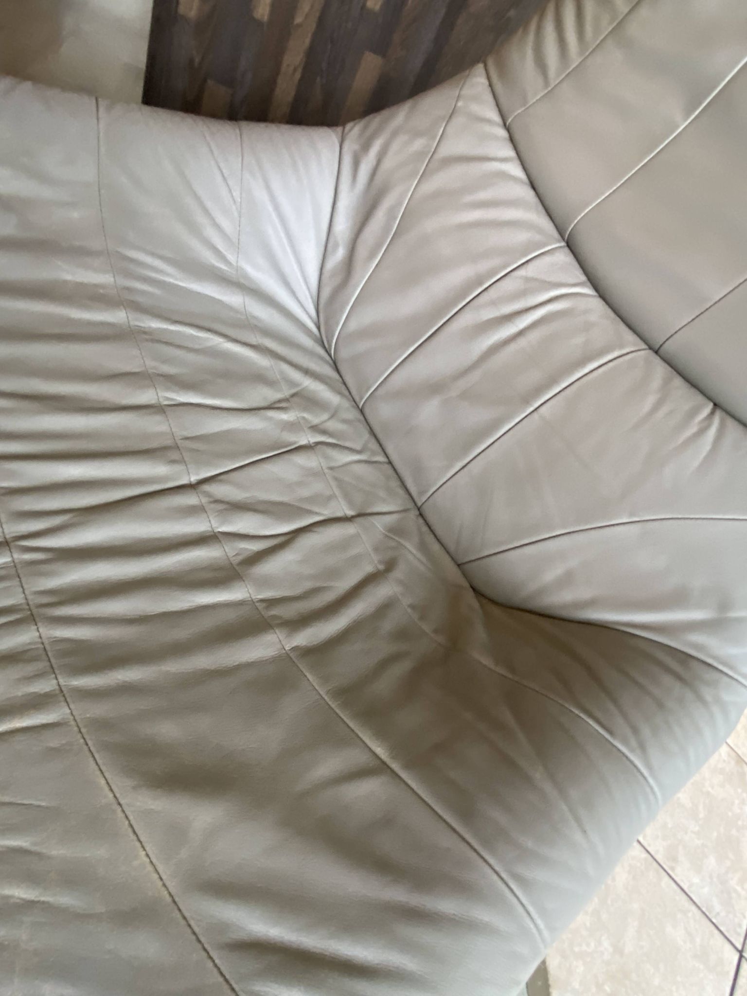 Swivel lounge chair ottoman footrest leather Mantis Gerard Van den Ber