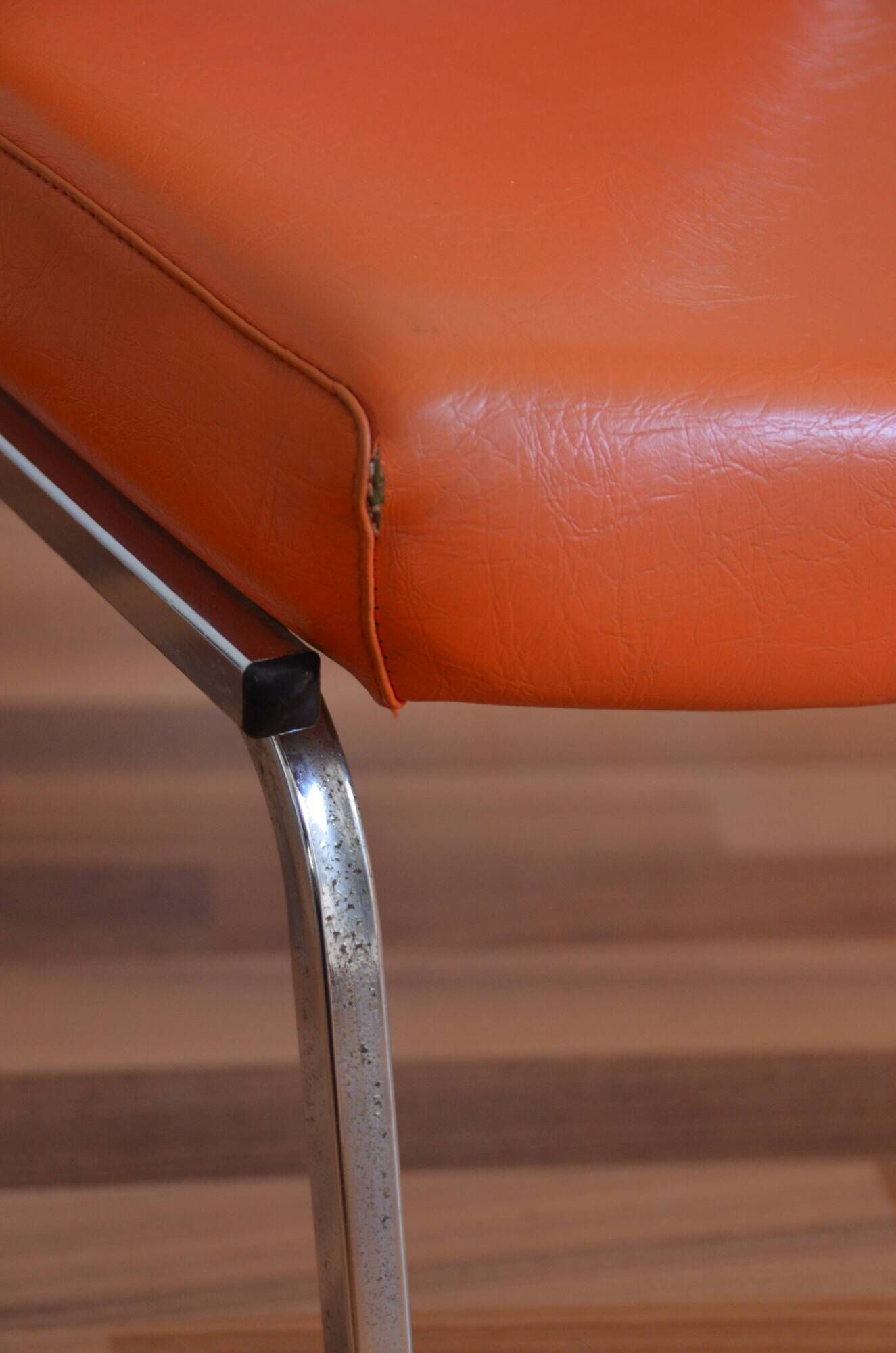 Armchair modernist vintage in orange leatherette 60 years