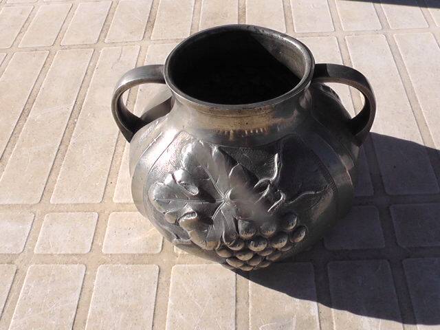 Pewter vase with vine decoration, 1930