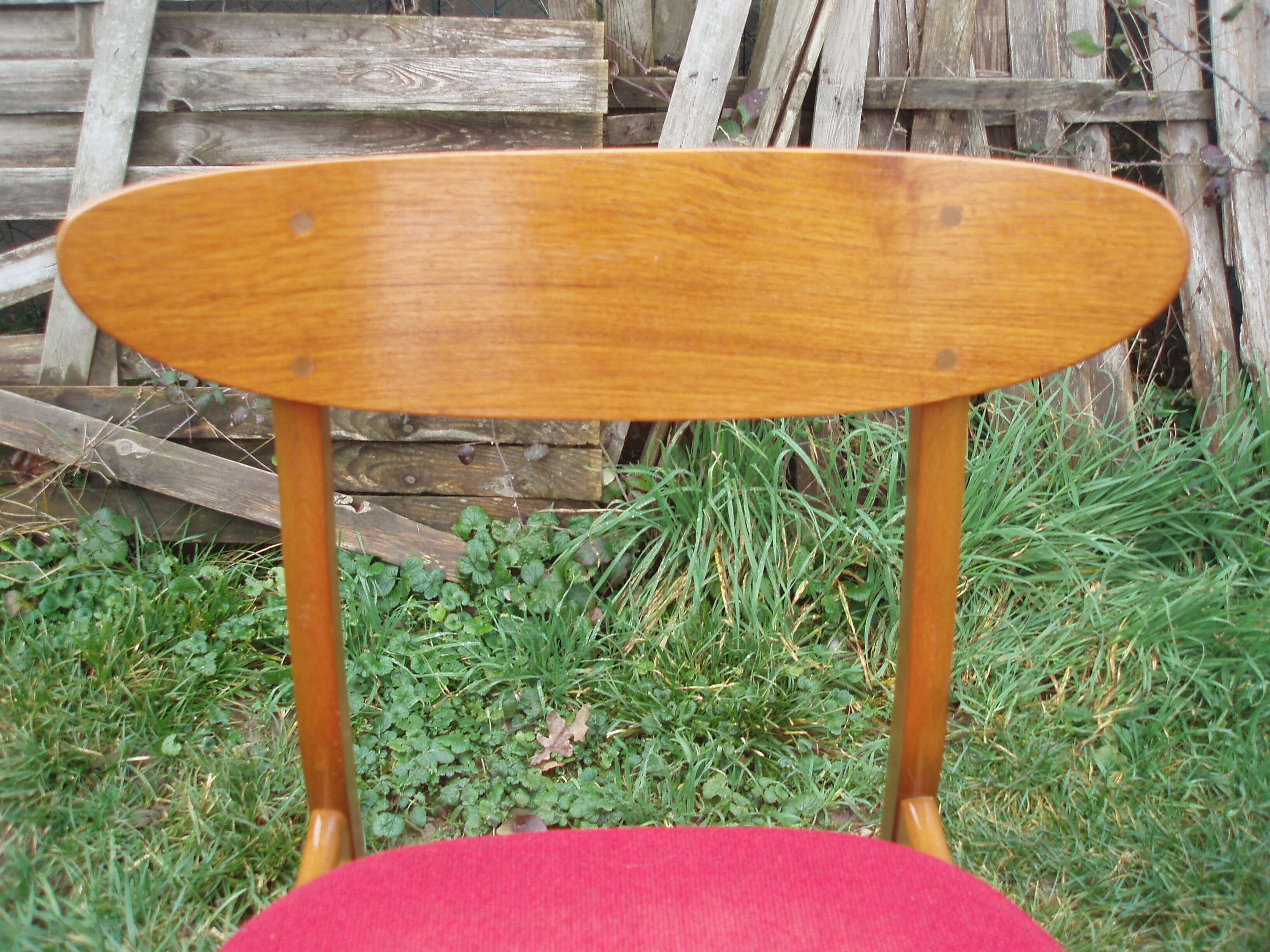 Pair of Scandinavian chairs in teak and red fabric