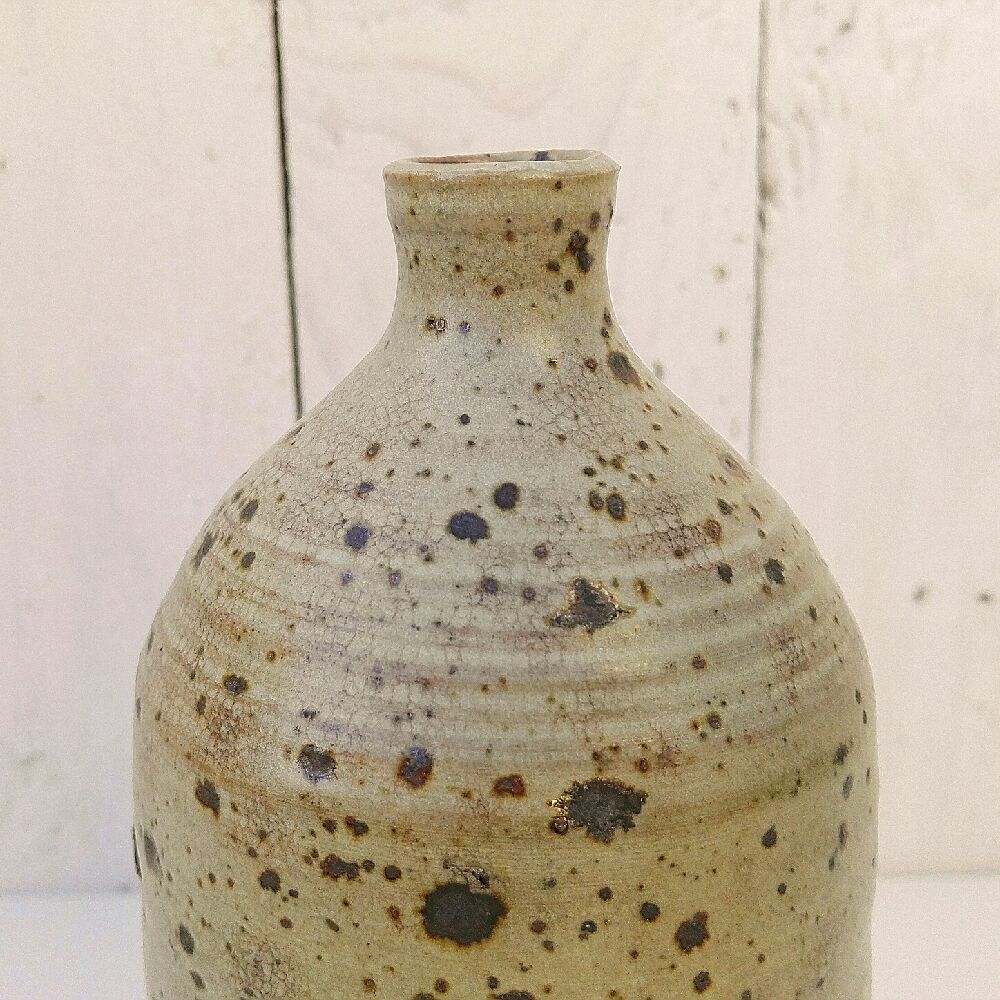 Bottle in sandstone pyrity vintage trendy decoration