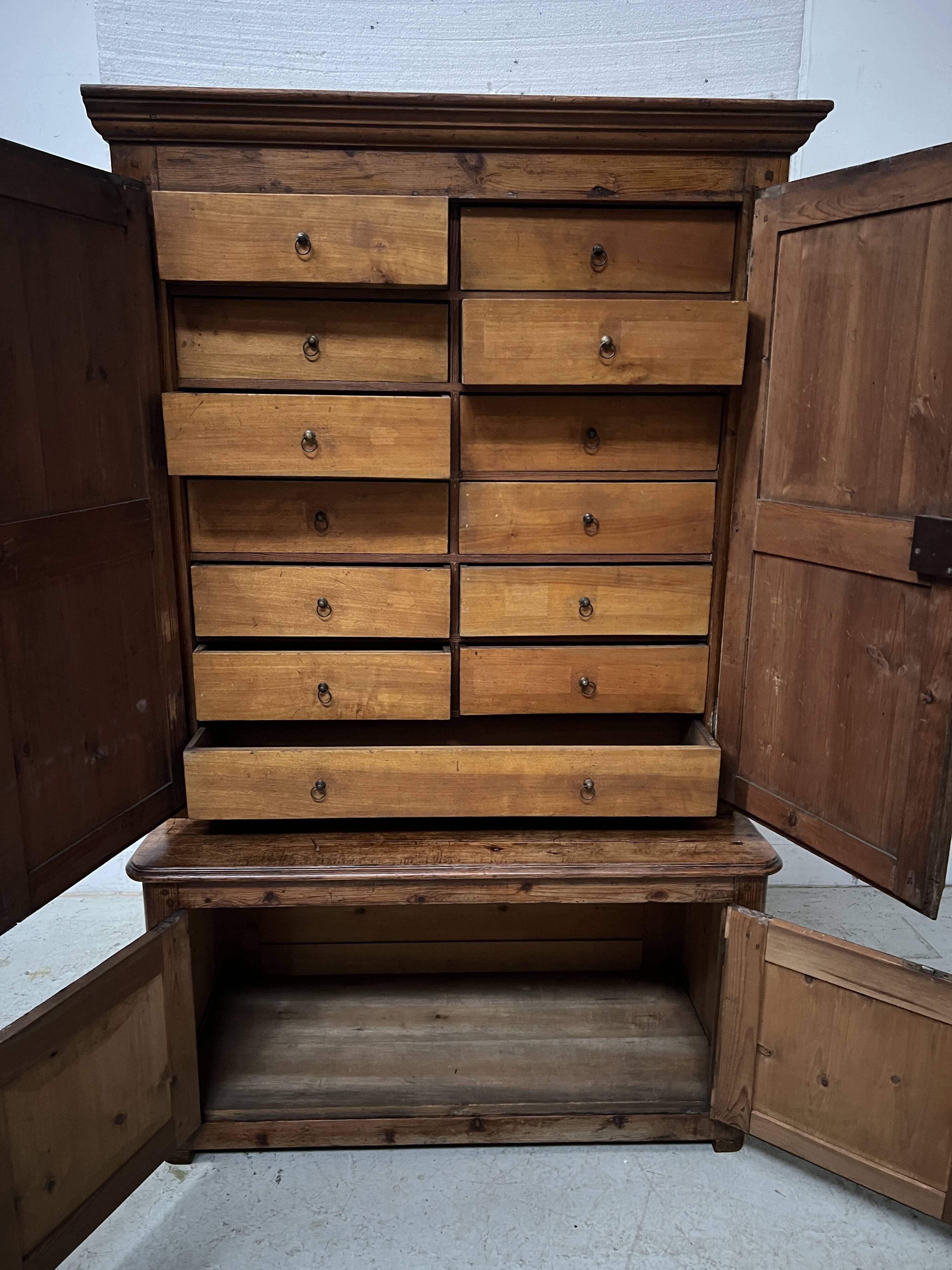 Two-part office furniture made of solid pine from the 20th century.