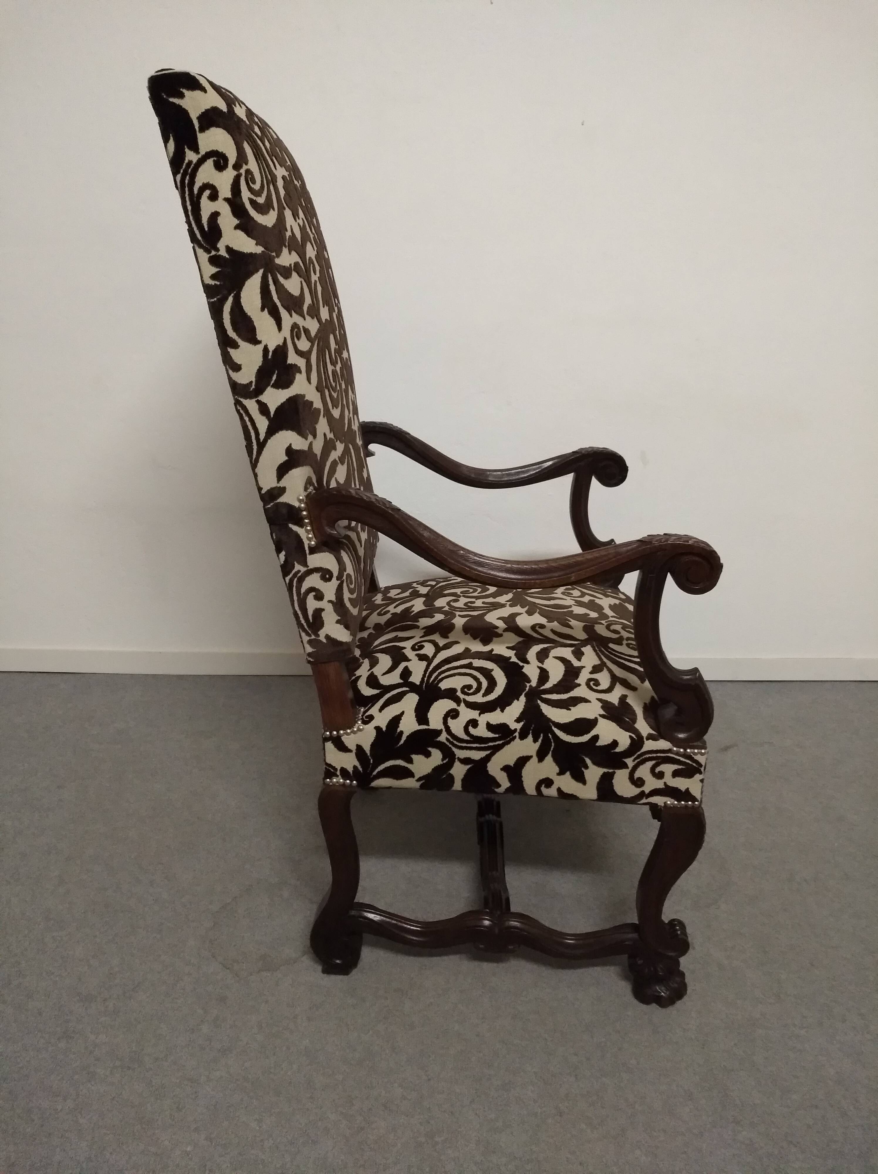 Pair of ceremonial armchairs in blackened oak, France late 18th century.