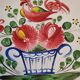 Antique pie dish in St Clément faience with a basket hen motif.