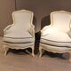 Pair of wing chairs in monochrome style louis XV beech