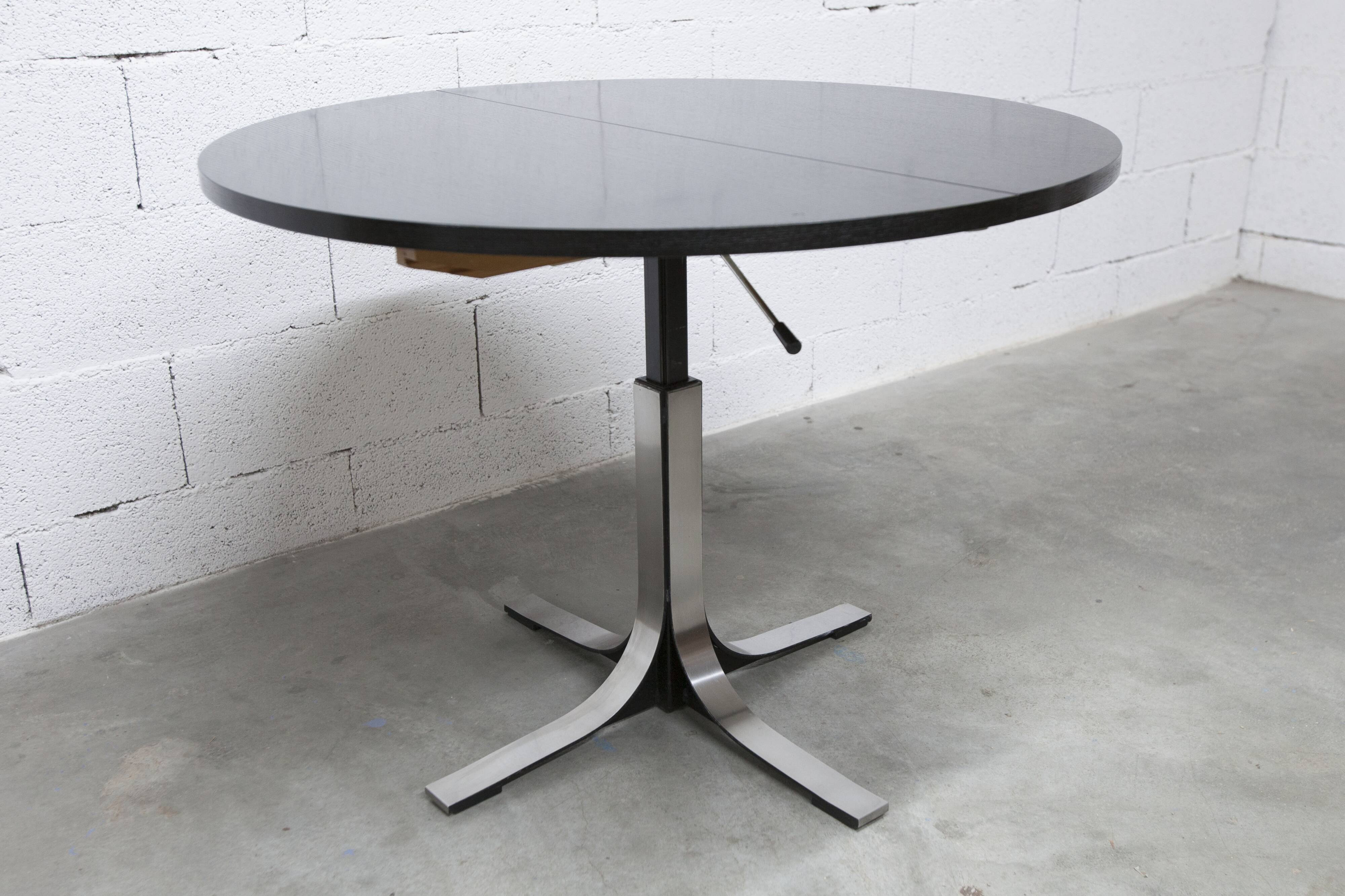 Round table rises and lowers Osvaldo Borsani black and chrome with extension