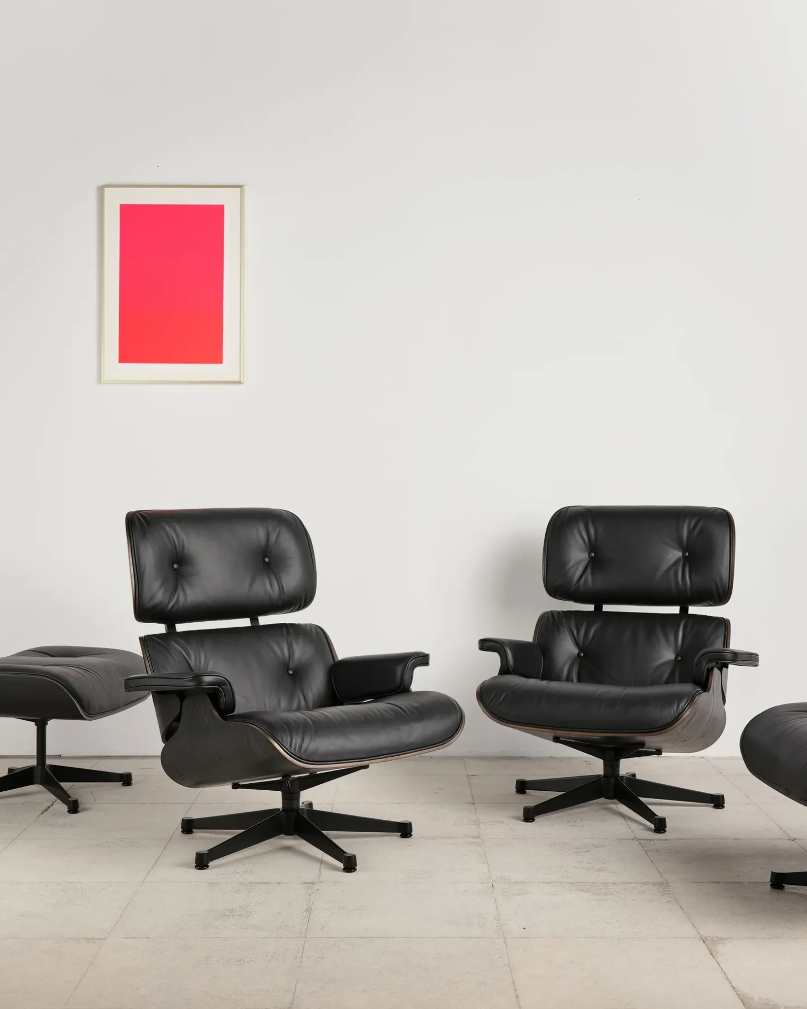 Lounge Chair and ottoman in black leather by Charles & Ray Eames, Vitra