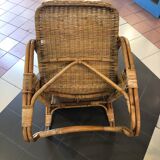 Old wicker rattan armchair