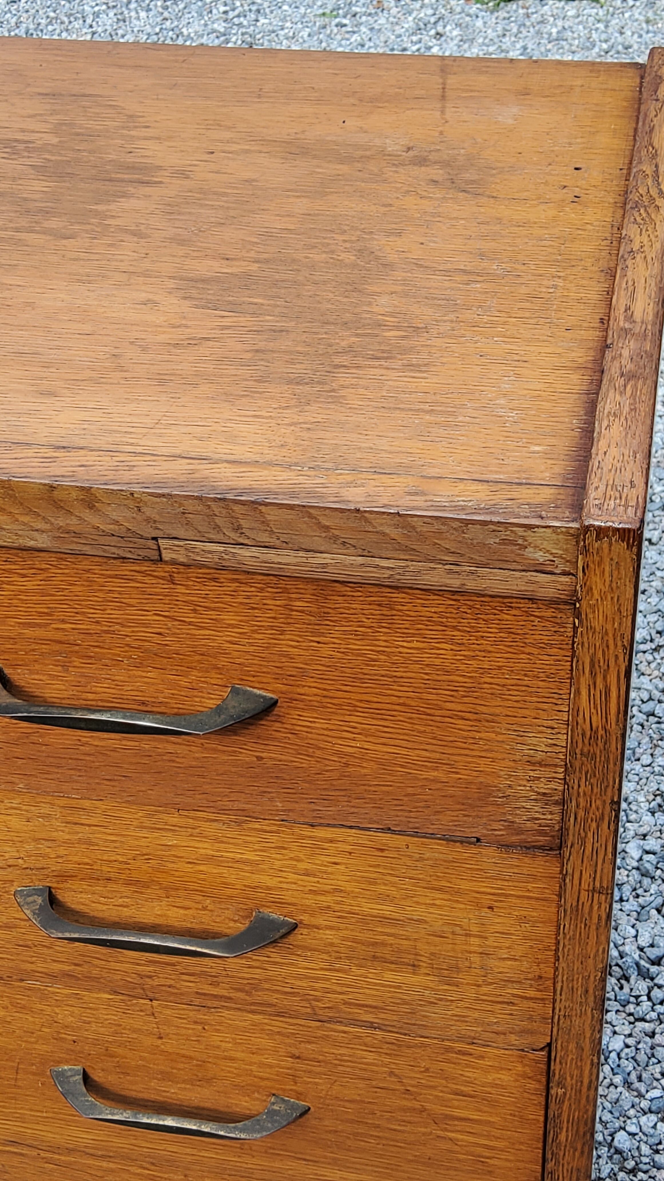 Chest of drawers of the 50s in golden blond oak 5 drawers conical feet