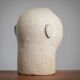 Modernist sculpted male bust in sandstone