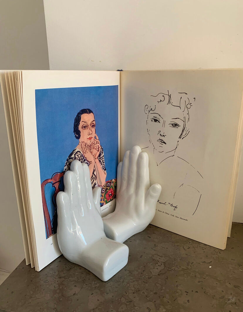 Vintage bookends in the shape of ceramic hands