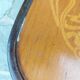 4 bentwood bistro chairs with a pattern on the seat