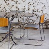 Oval dining table in chrome and smoked glass, 1970.