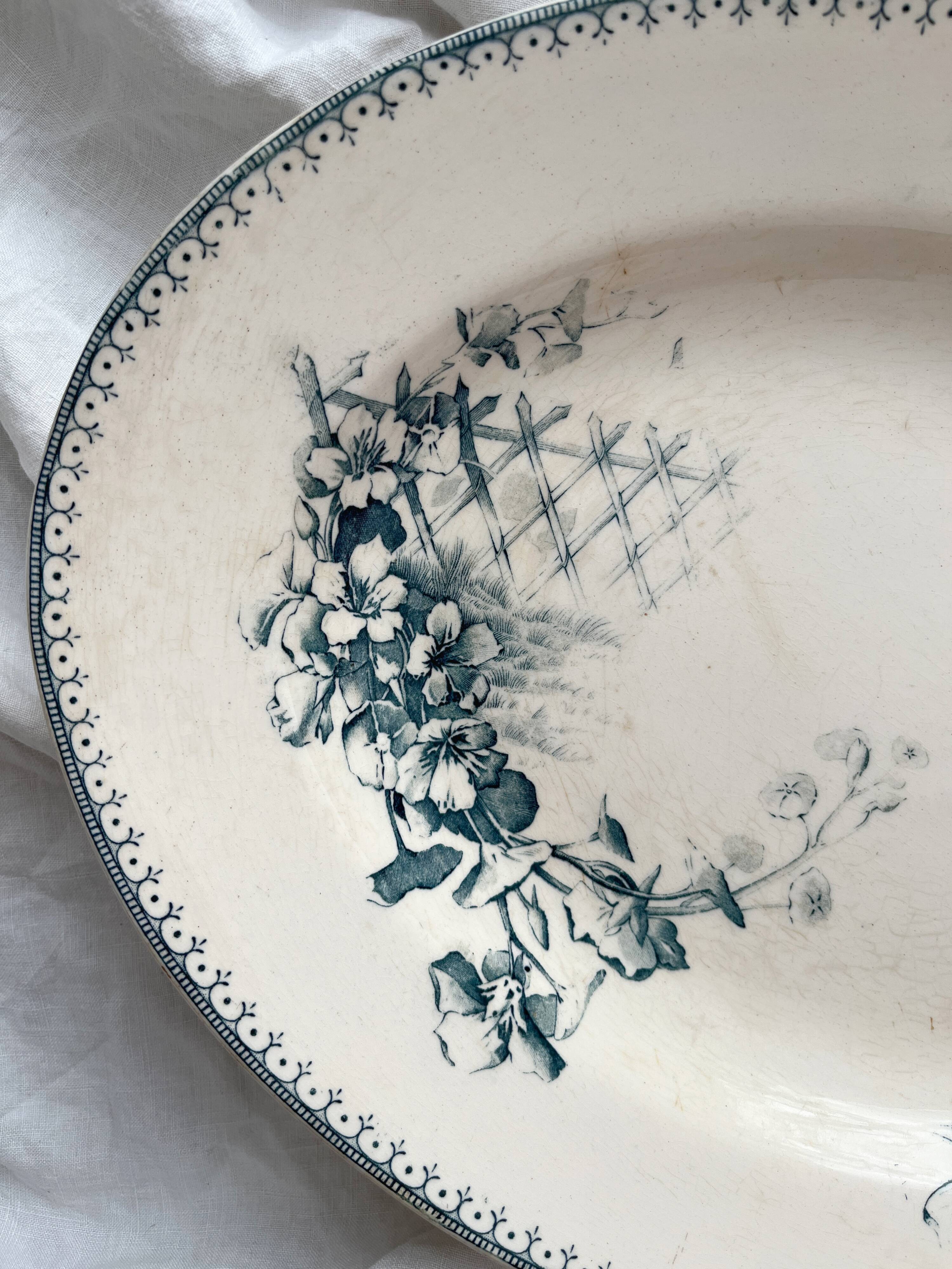 Plat ovale terre de fer fleurs oiseaux "Malaga" Petrus Regout
