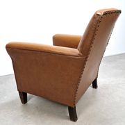 50s club chair in imitation leather and wood