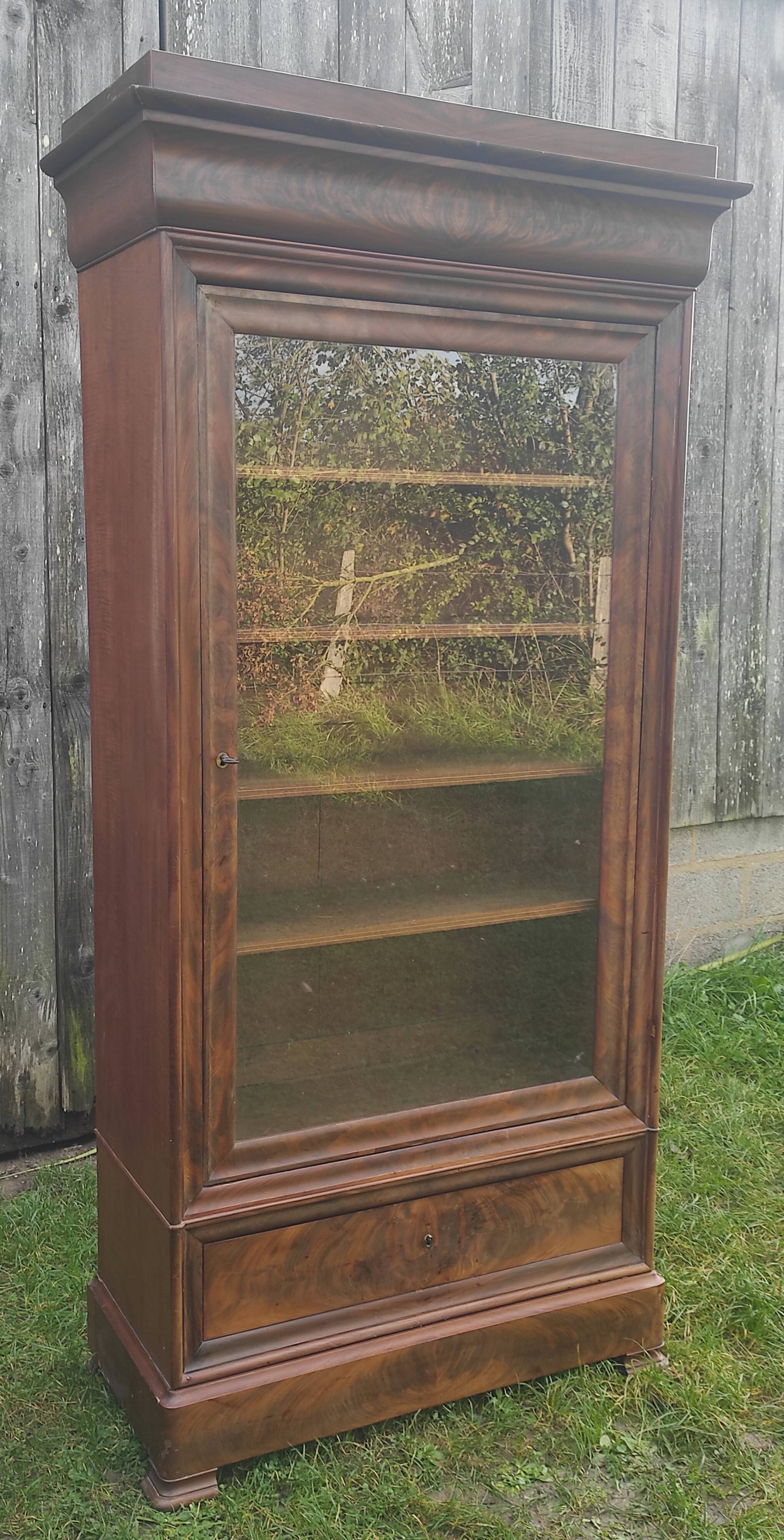 Parisian glass cabinet.
