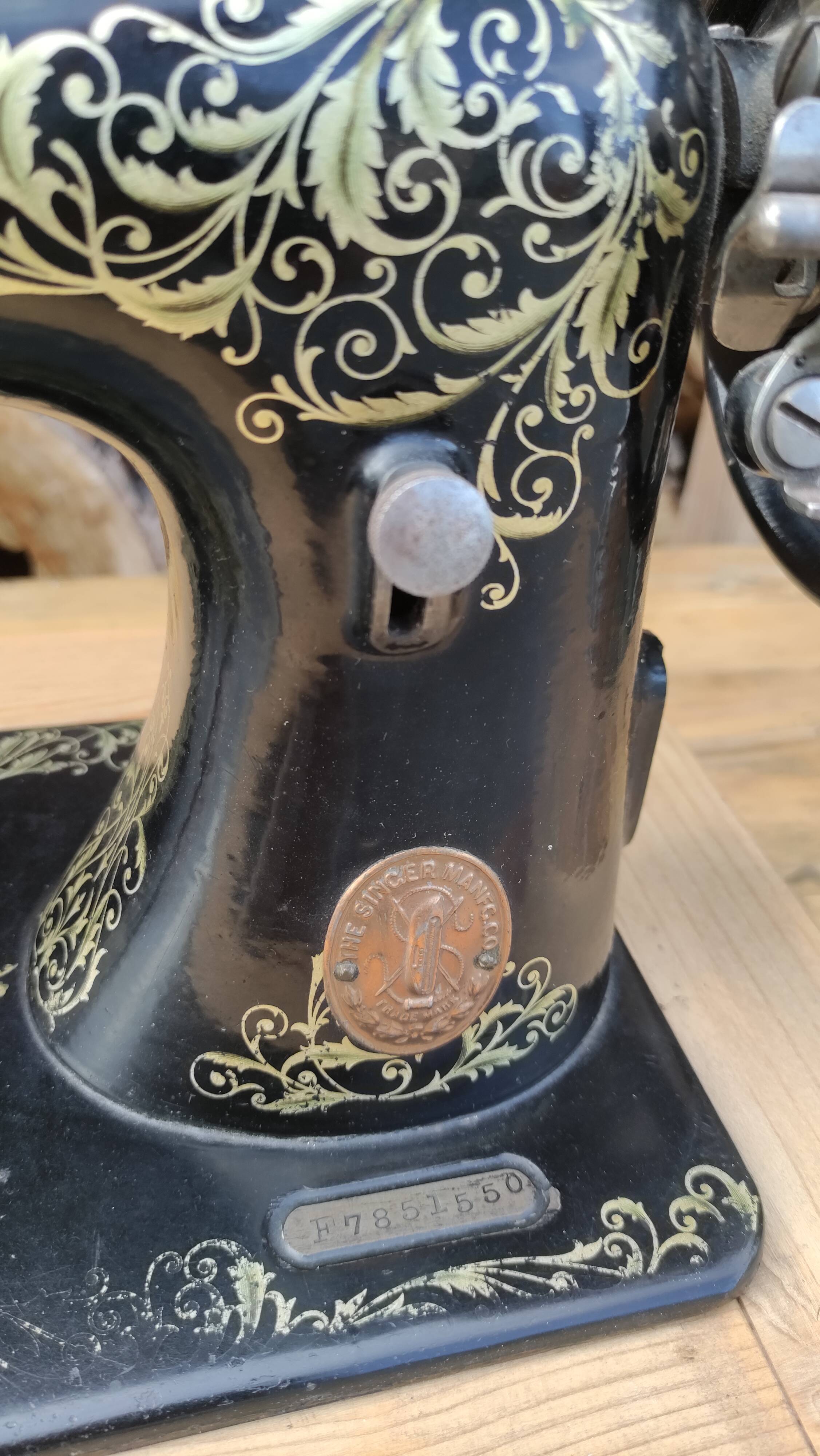 Old Singer sewing machine on pedestal