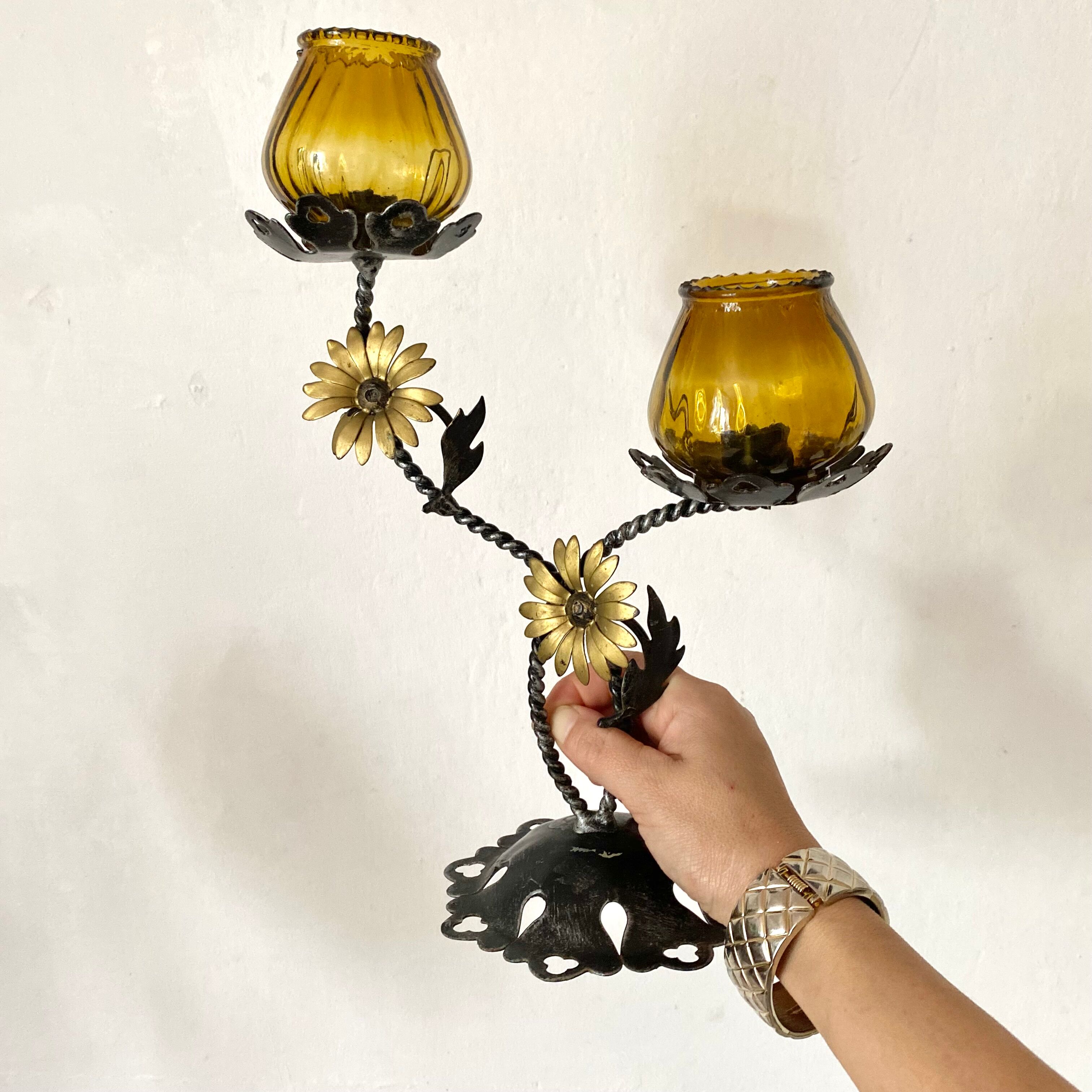 Double candle holder in metal and amber glass