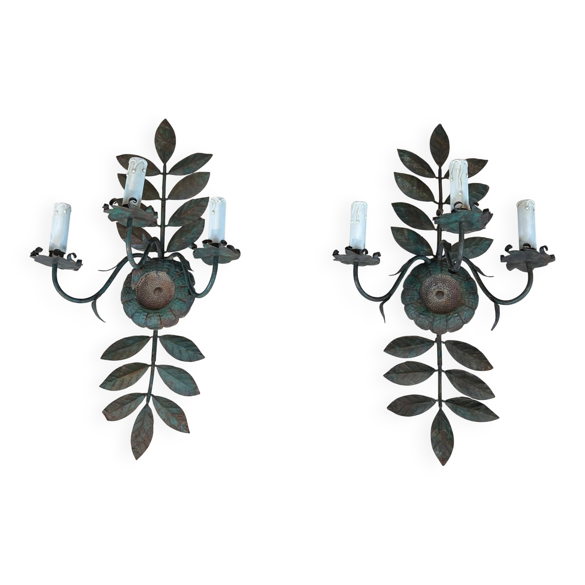 Pair of decorative wall sconces with sunflowers and patinated metal foliage.