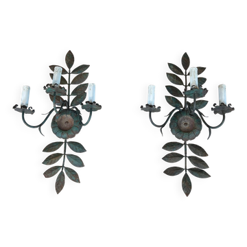 Pair of decorative wall sconces with sunflowers and patinated metal foliage.