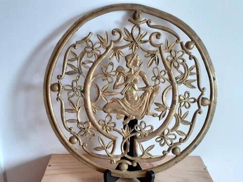 Old metal trivet