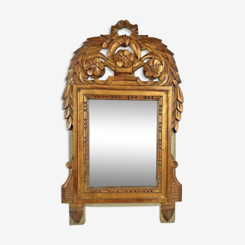 Miroir ancien de style Louis XVI en bois sculpté