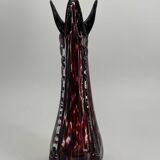 Vintage vase spotted in dark red color
