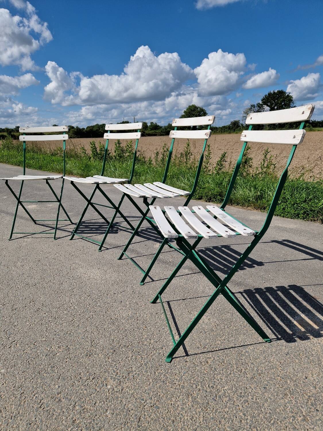 Set of 4 folding wrought iron bistro chairs