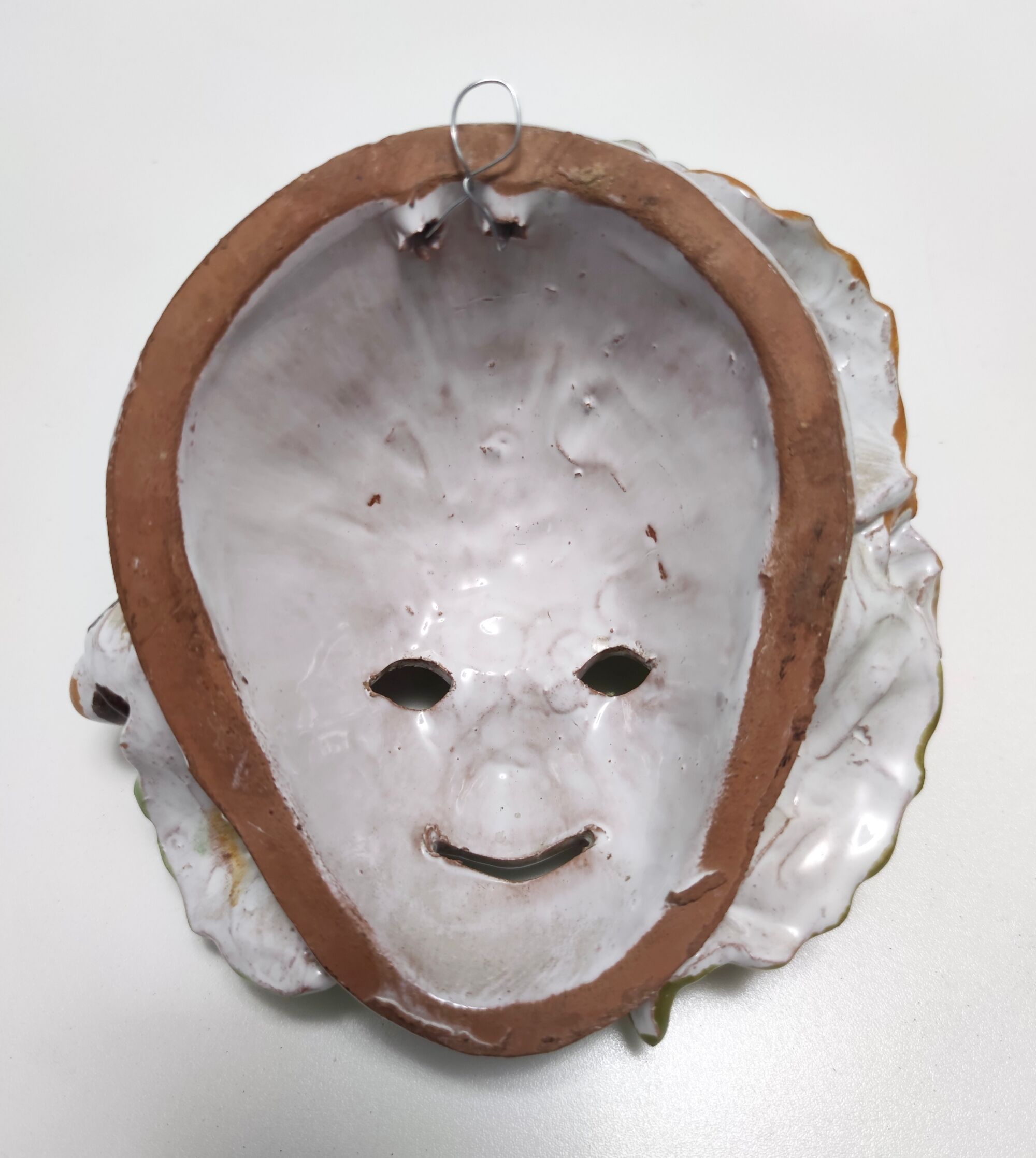 Vintage earthware commedia mask, florence