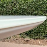 Oval designer dining table in frosted glass and brushed stainless steel