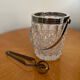 Ice bucket with its pliers