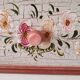 Painted chest of drawers with floral decoration