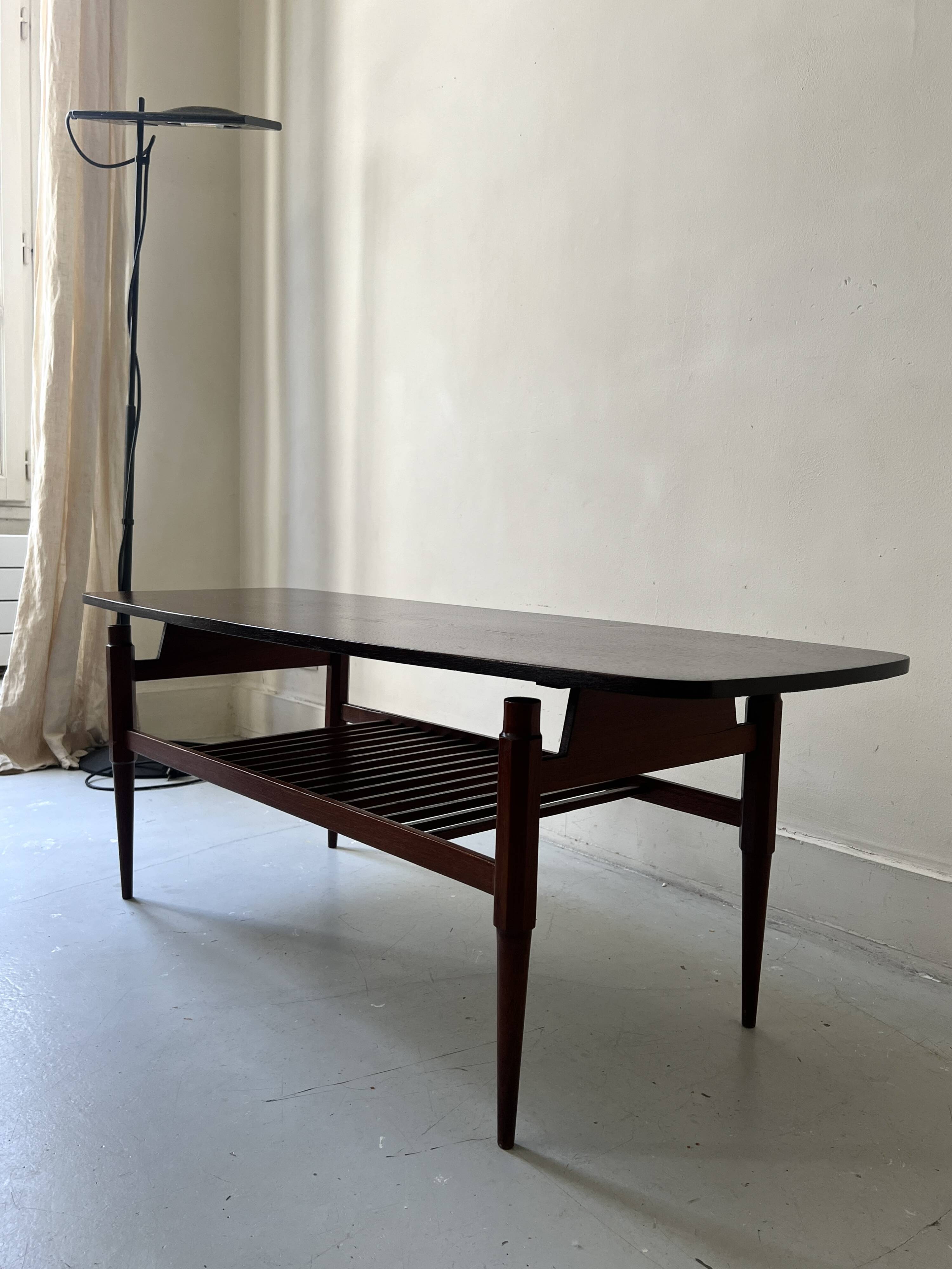 Danish teak coffee table with a double top, 1950s design.