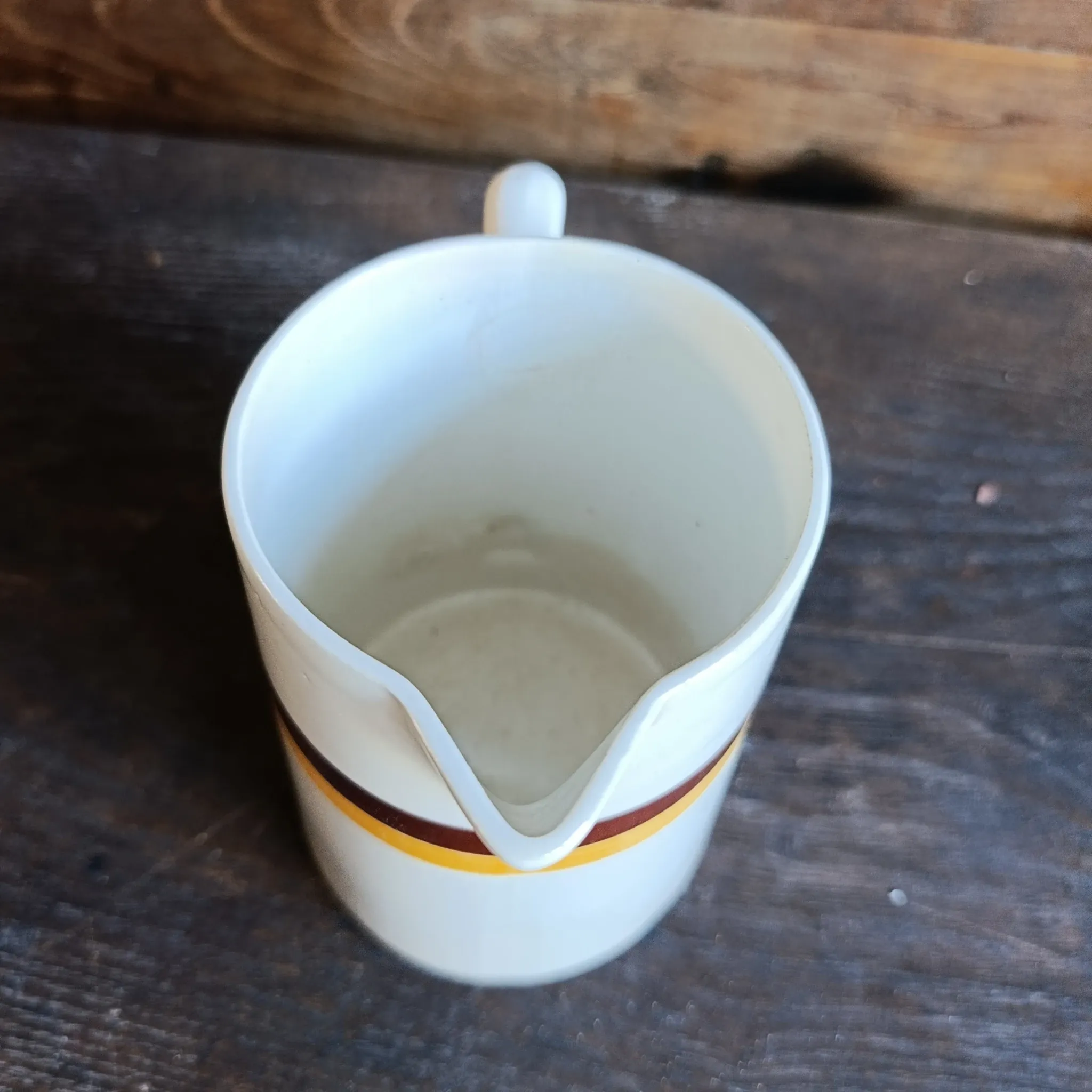 Vintage French ceramic pitcher with brown and ochre stripes