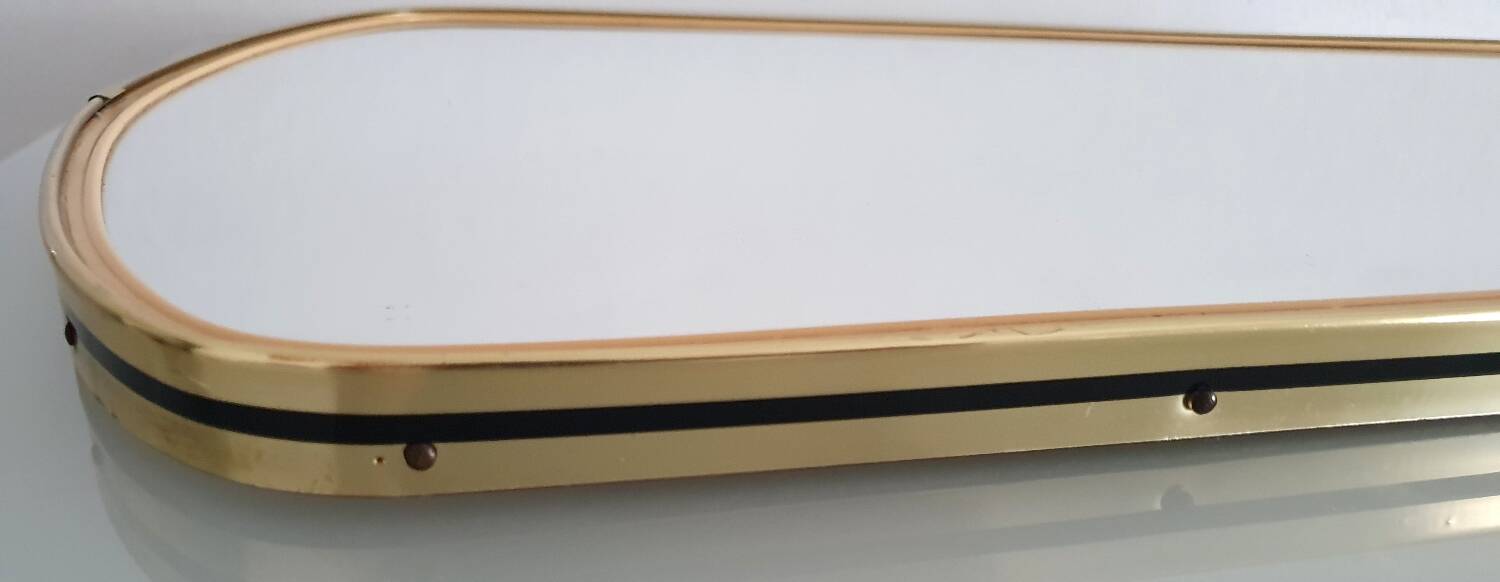 Large vintage ovoid mirror with gold and black edges - 1960s