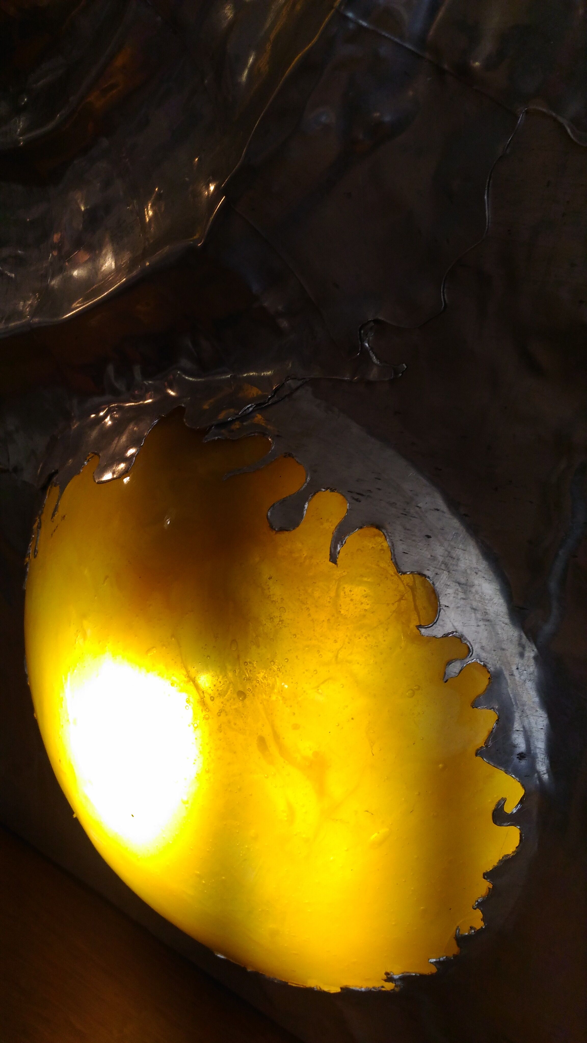 Bright sculptural wall sconce