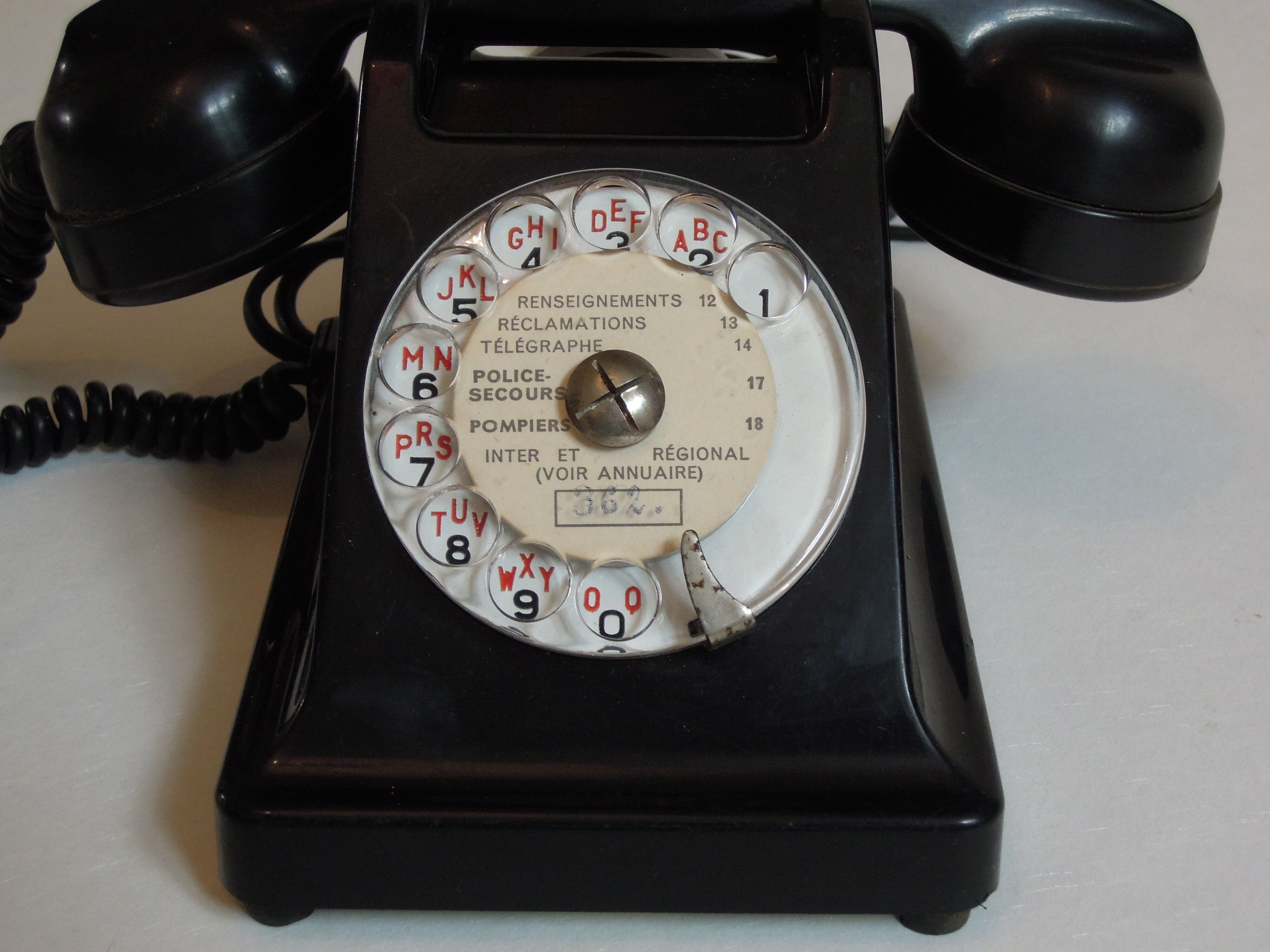 Ancient black bakelite  telephone