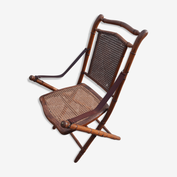 Fauteuil pliant en bambou et cannage, cuir et laiton