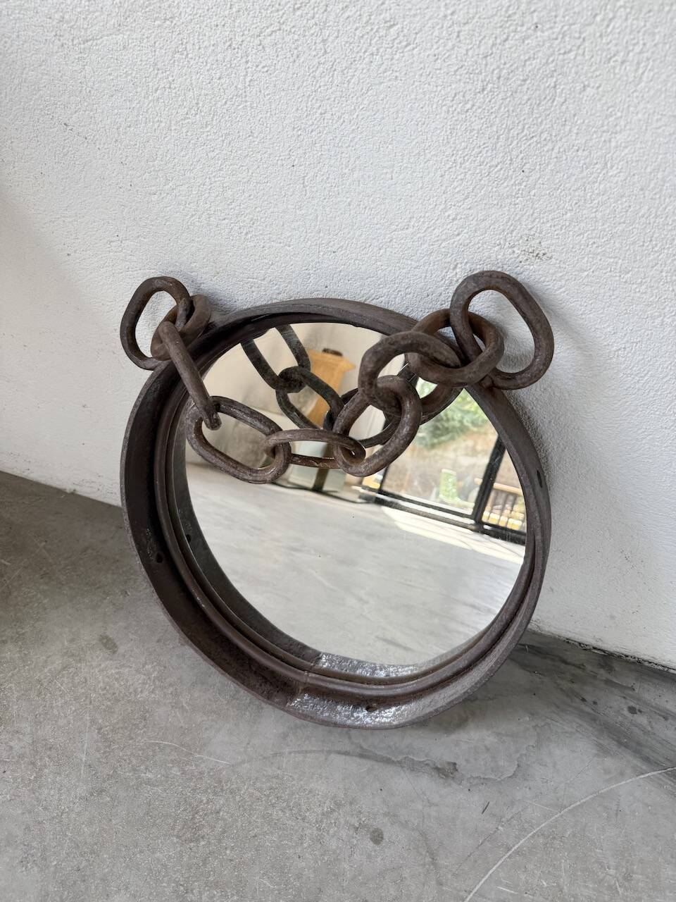Brutalist mirror with metal chain from the 50s