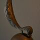 Sculptural table lamp in brass and opaline glass, early 20th century.