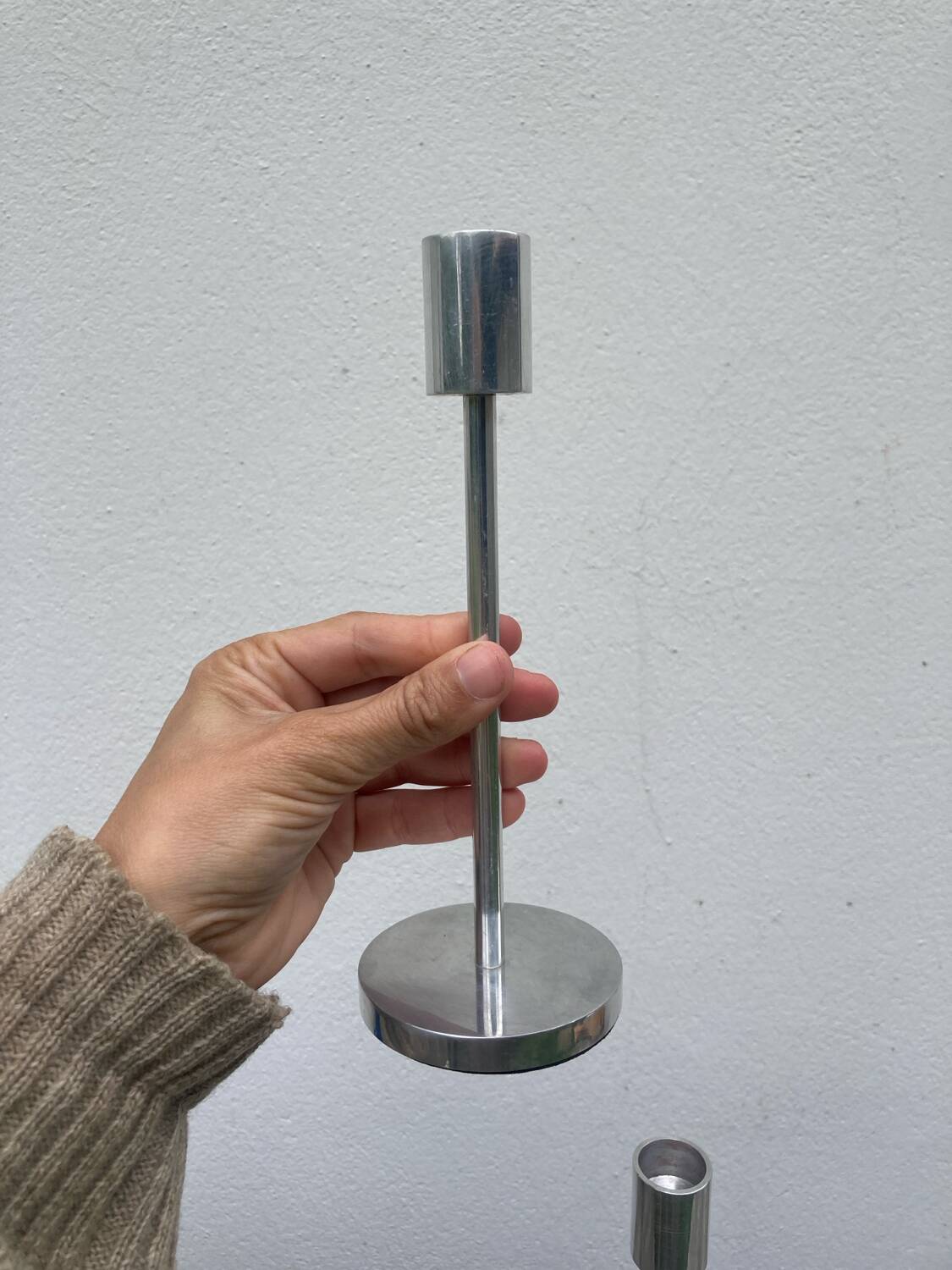 Pair of modernist aluminum candlesticks