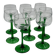 Set of 8 green stemmed wine glasses made in France.