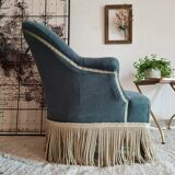 Green velvet toad armchair with fringes