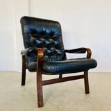 Vintage mid-century Scandinavian black leather lounge chair 1970s