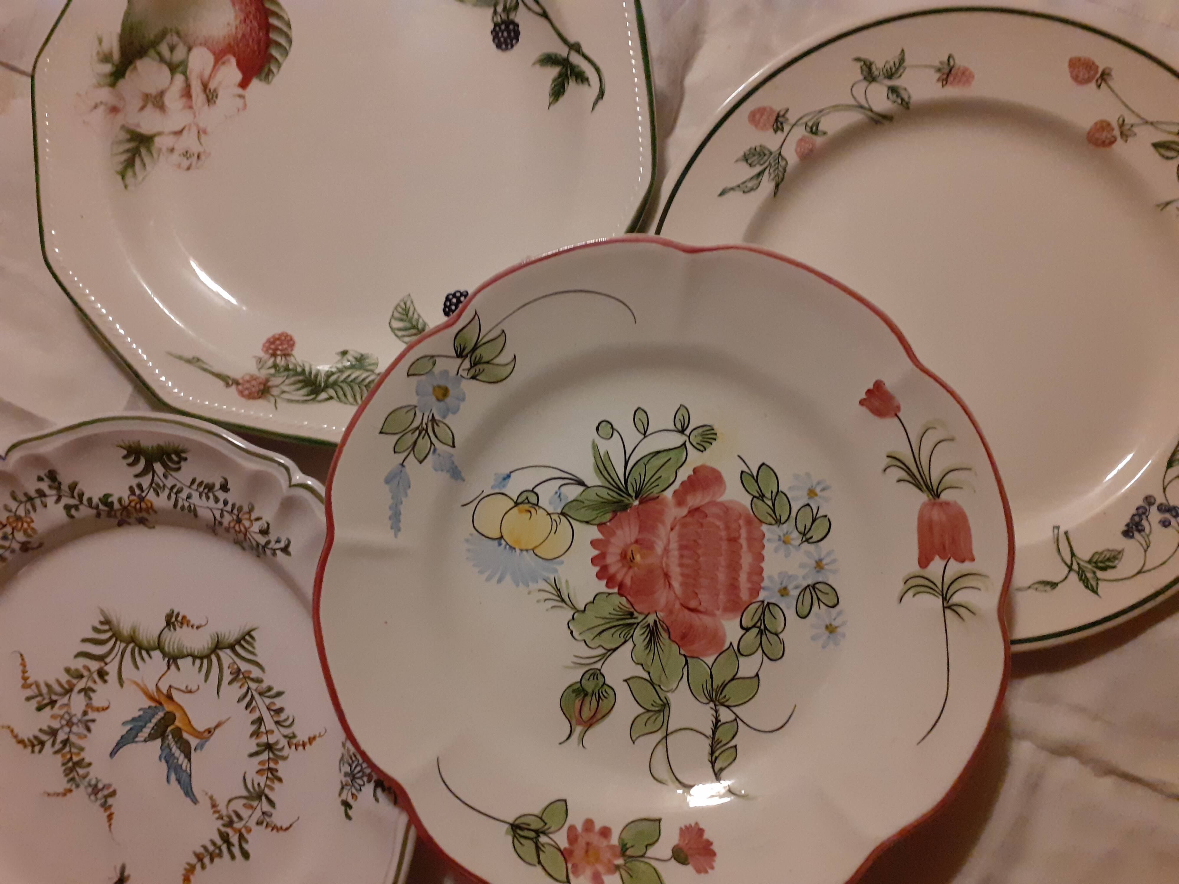 Set of four retro fruit and flower flat plates from Moustiers...